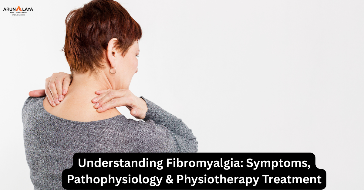 Woman holding neck in pain, illustrating fibromyalgia symptoms and physiotherapy treatment